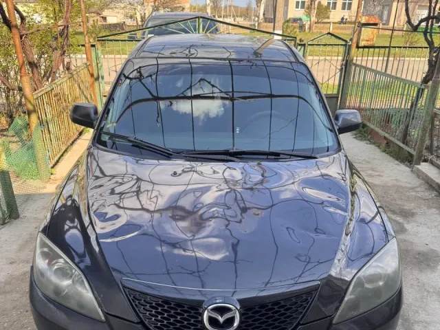 Mazda 3 - фото 4
