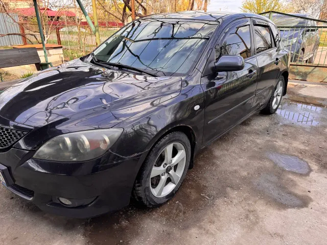 Mazda 3 - фото 2