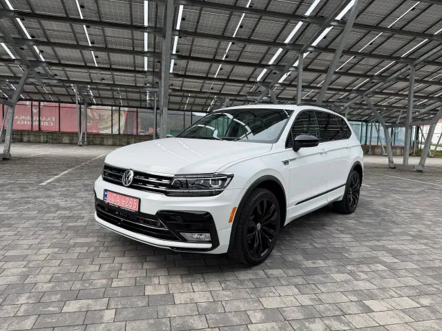 Volkswagen Tiguan - фото 1