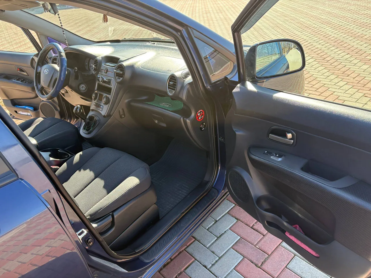 Kia Carens - фото 23