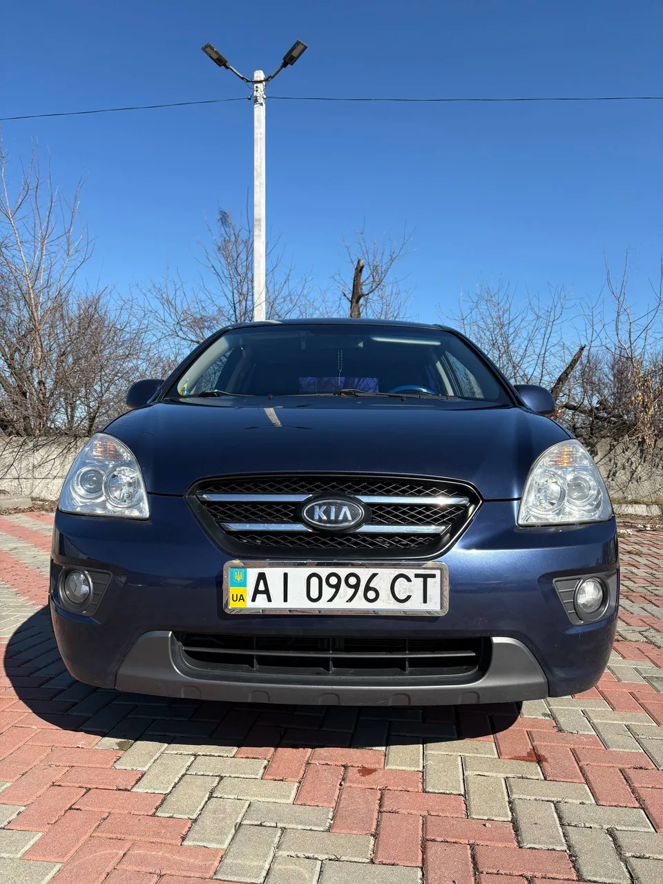 Kia Carens - фото 7
