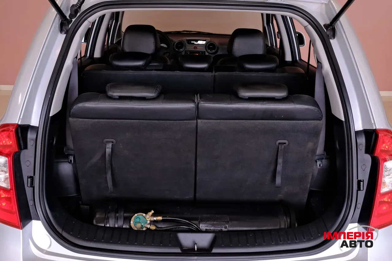 Kia Carens - фото 10