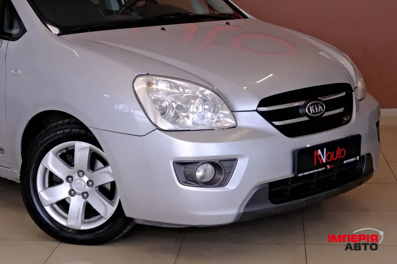 Kia Carens - фото 3