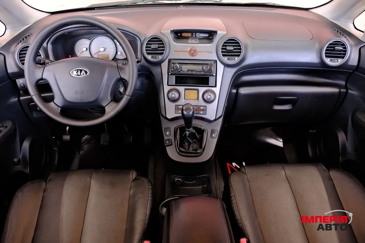 Kia Carens - фото 7