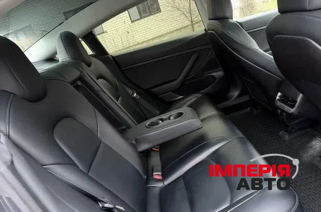 Tesla Model 3 - фото 12