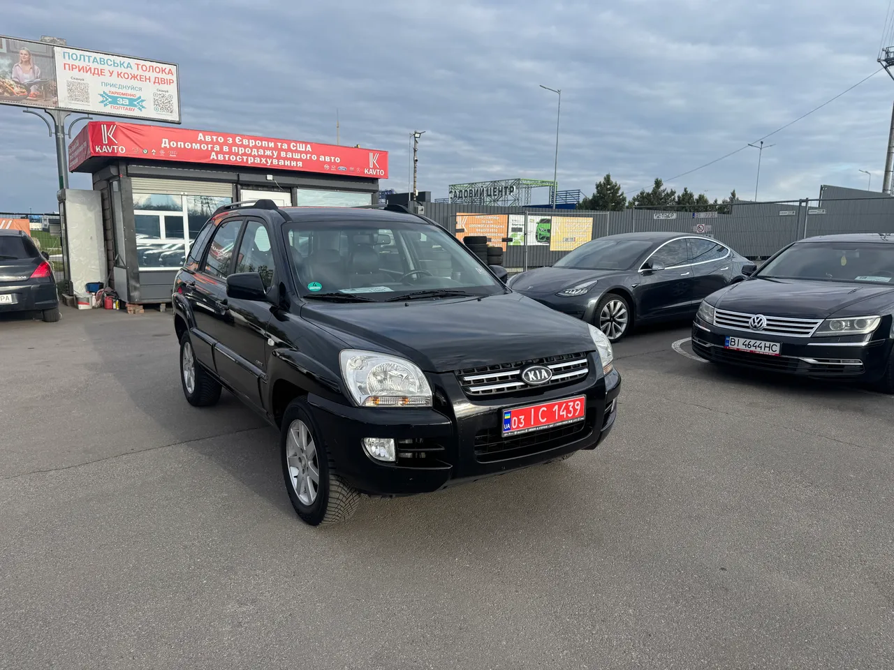 Kia Sportage - фото 1