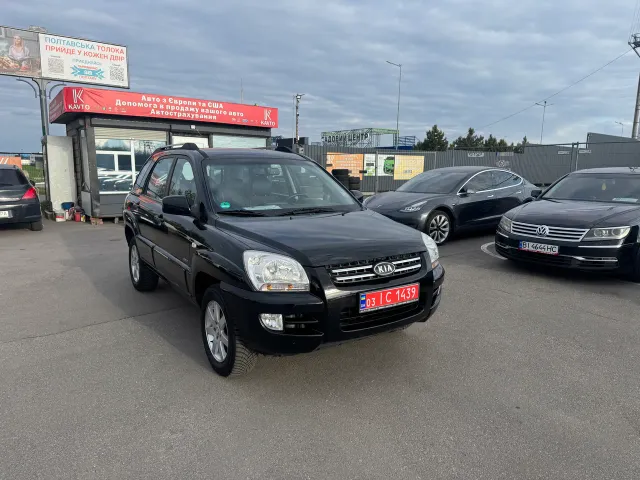 Kia Sportage - фото 1