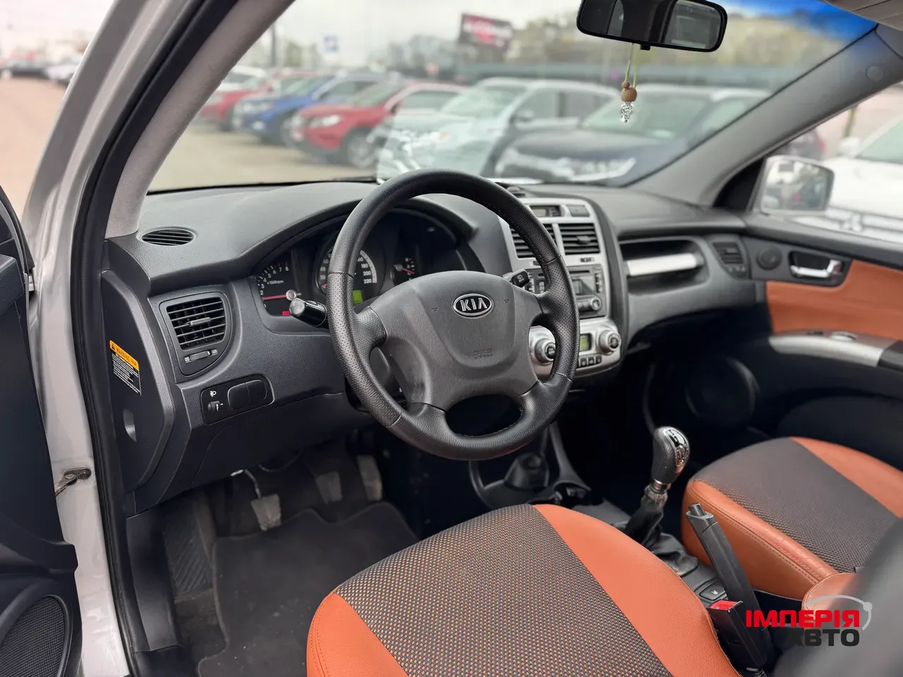 Kia Sportage - фото 12