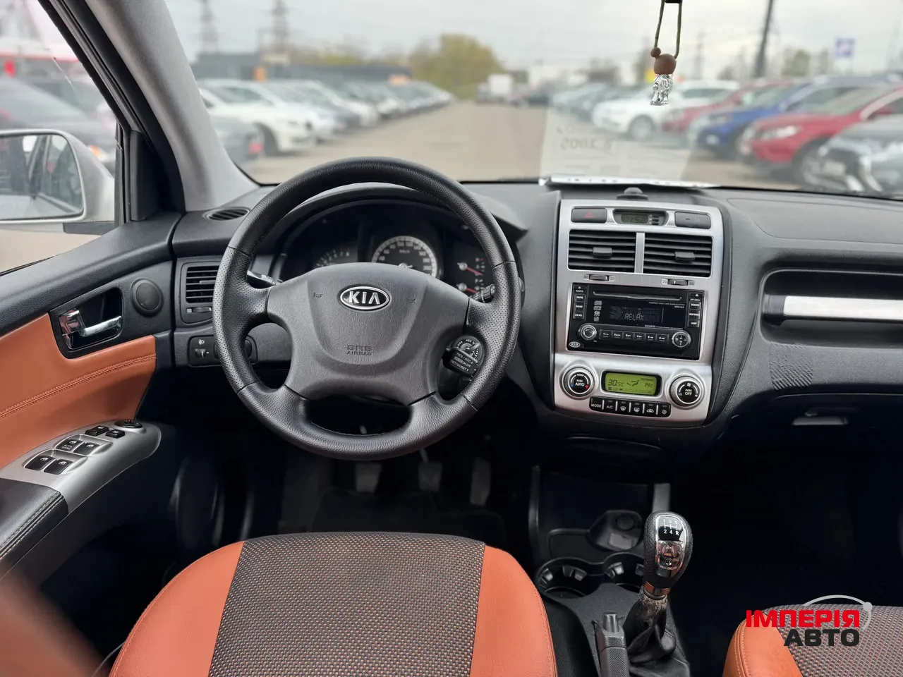 Kia Sportage - фото 11