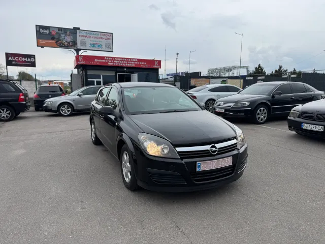 Opel Astra - фото 1