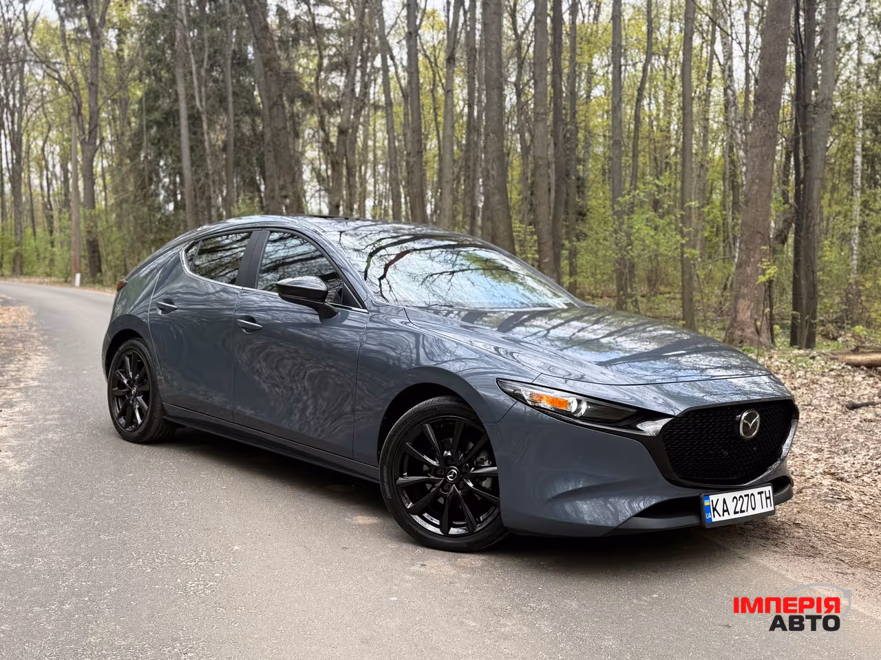 Mazda 3 - фото 11