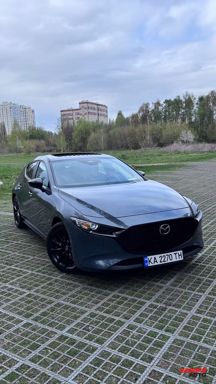 Mazda 3 - фото 5