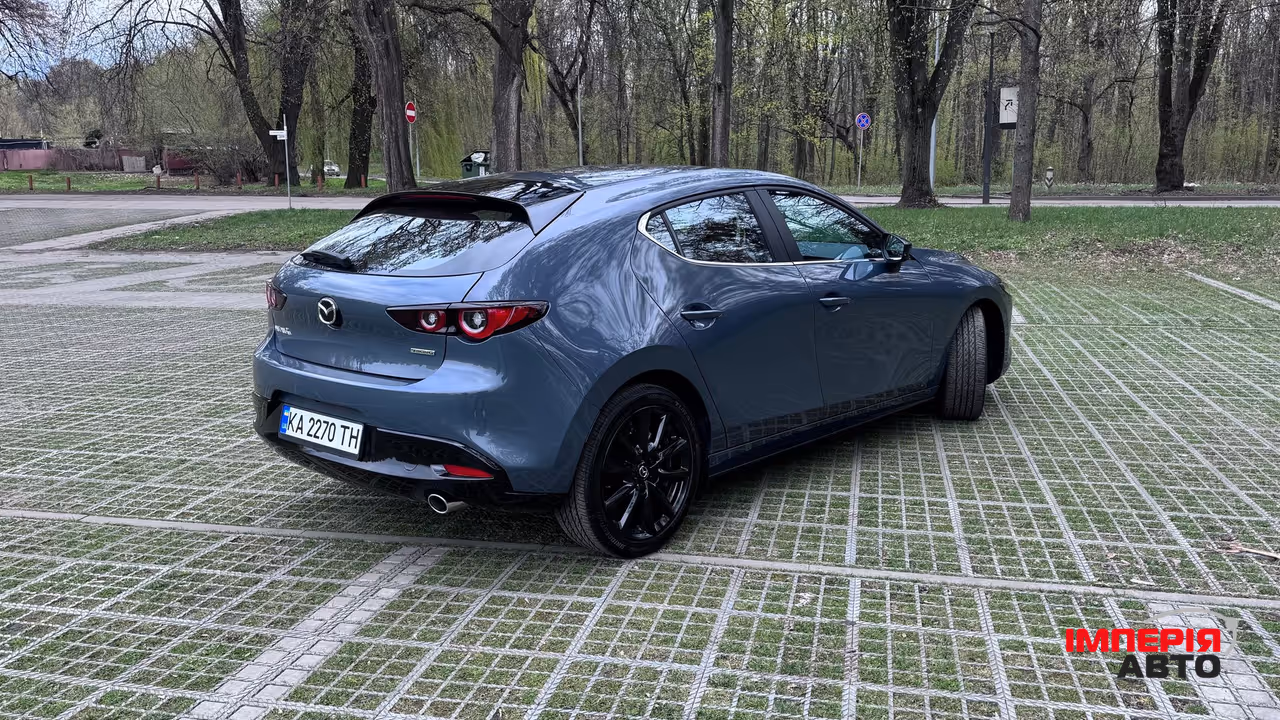 Mazda 3 - фото 4