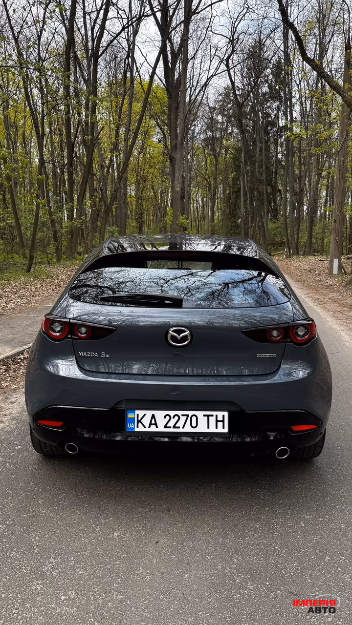 Mazda 3 - фото 6