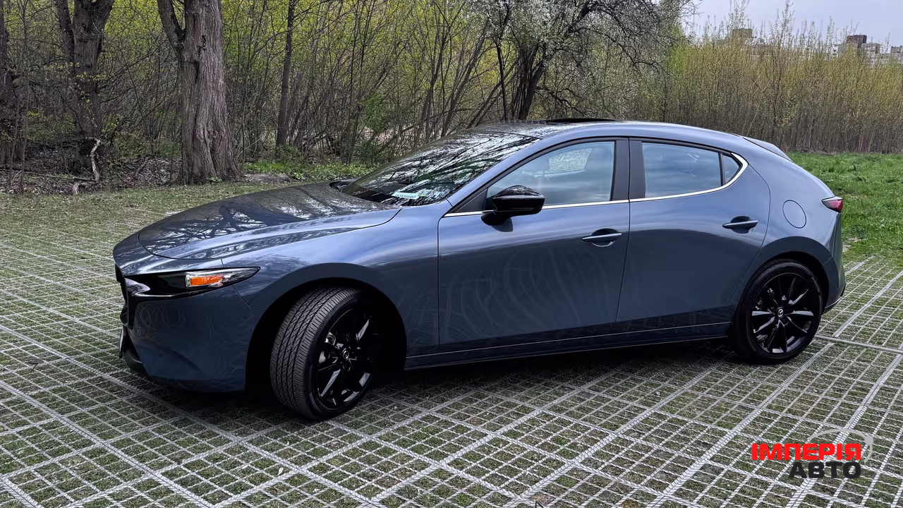 Mazda 3 - фото 3
