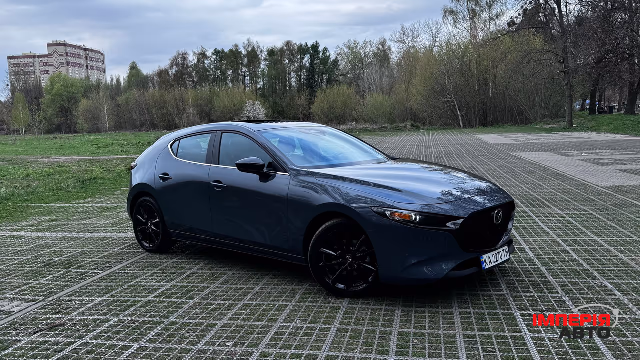 Mazda 3 - фото 1