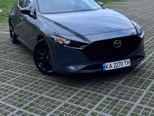 Mazda 3 - фото 5