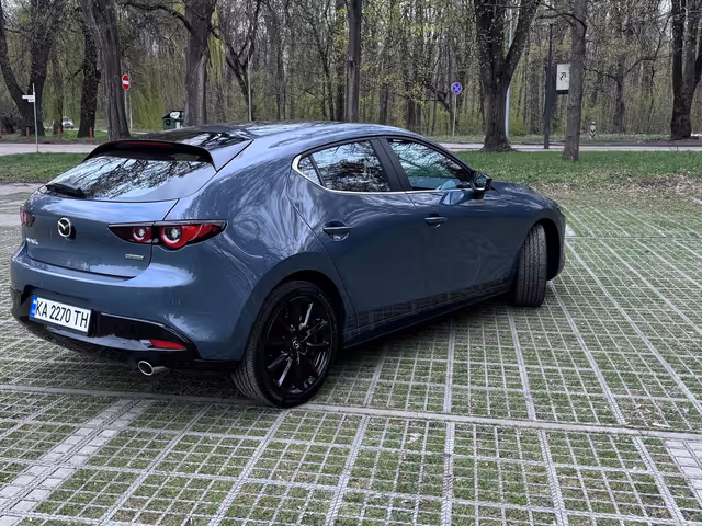 Mazda 3 - фото 4