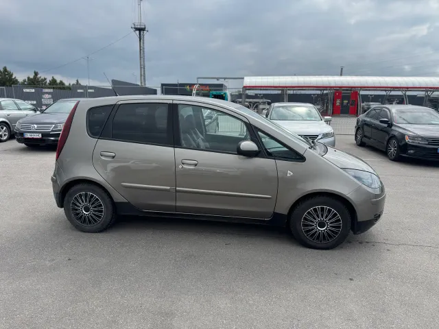Mitsubishi Colt - фото 4