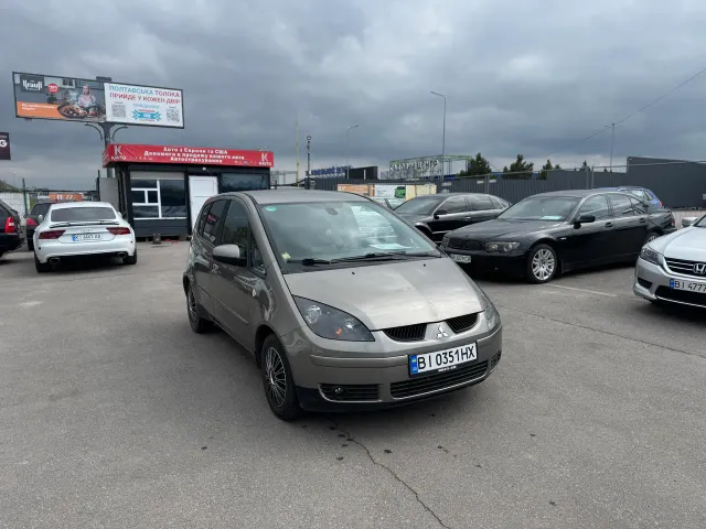 Mitsubishi Colt - фото 1