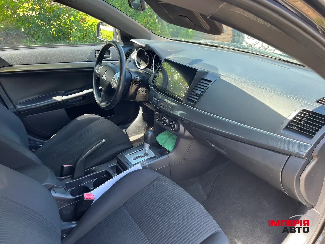 Mitsubishi Lancer - фото 16