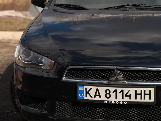 Mitsubishi Lancer - фото 1