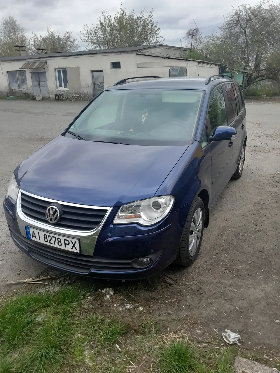 Volkswagen Touran - фото 1
