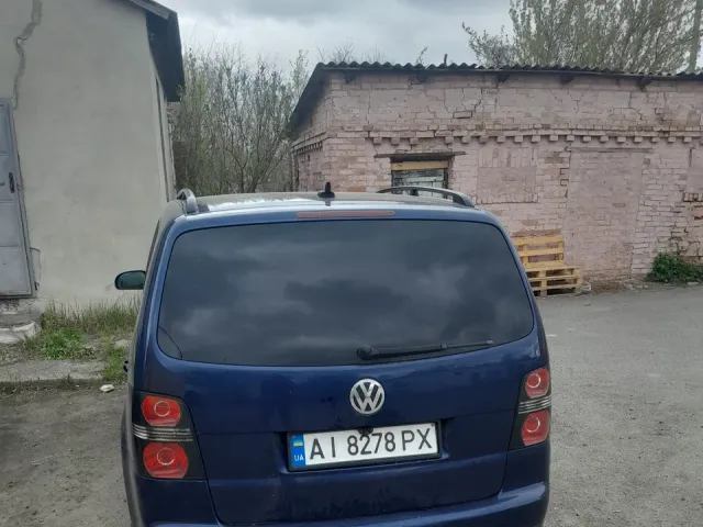 Volkswagen Touran - фото 3