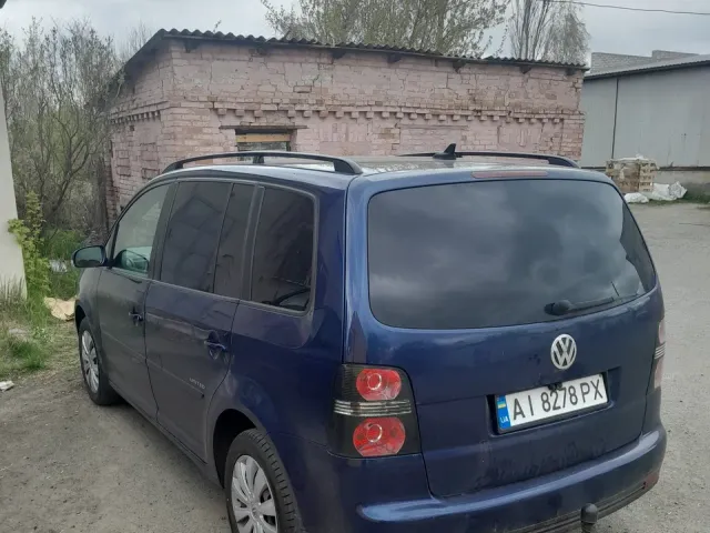 Volkswagen Touran - фото 2