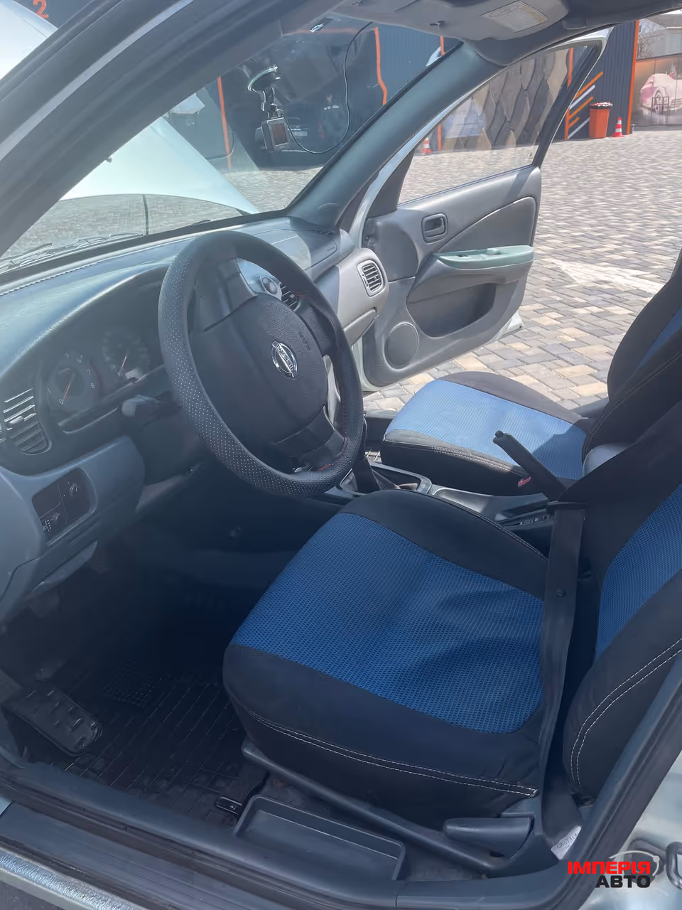 Nissan Almera Classic - фото 11