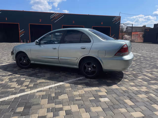 Nissan Almera Classic - фото 4