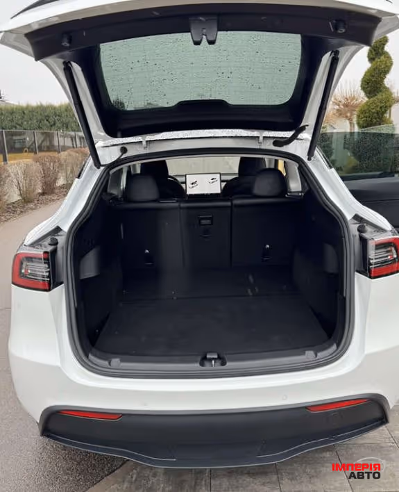 Tesla Model Y - фото 8