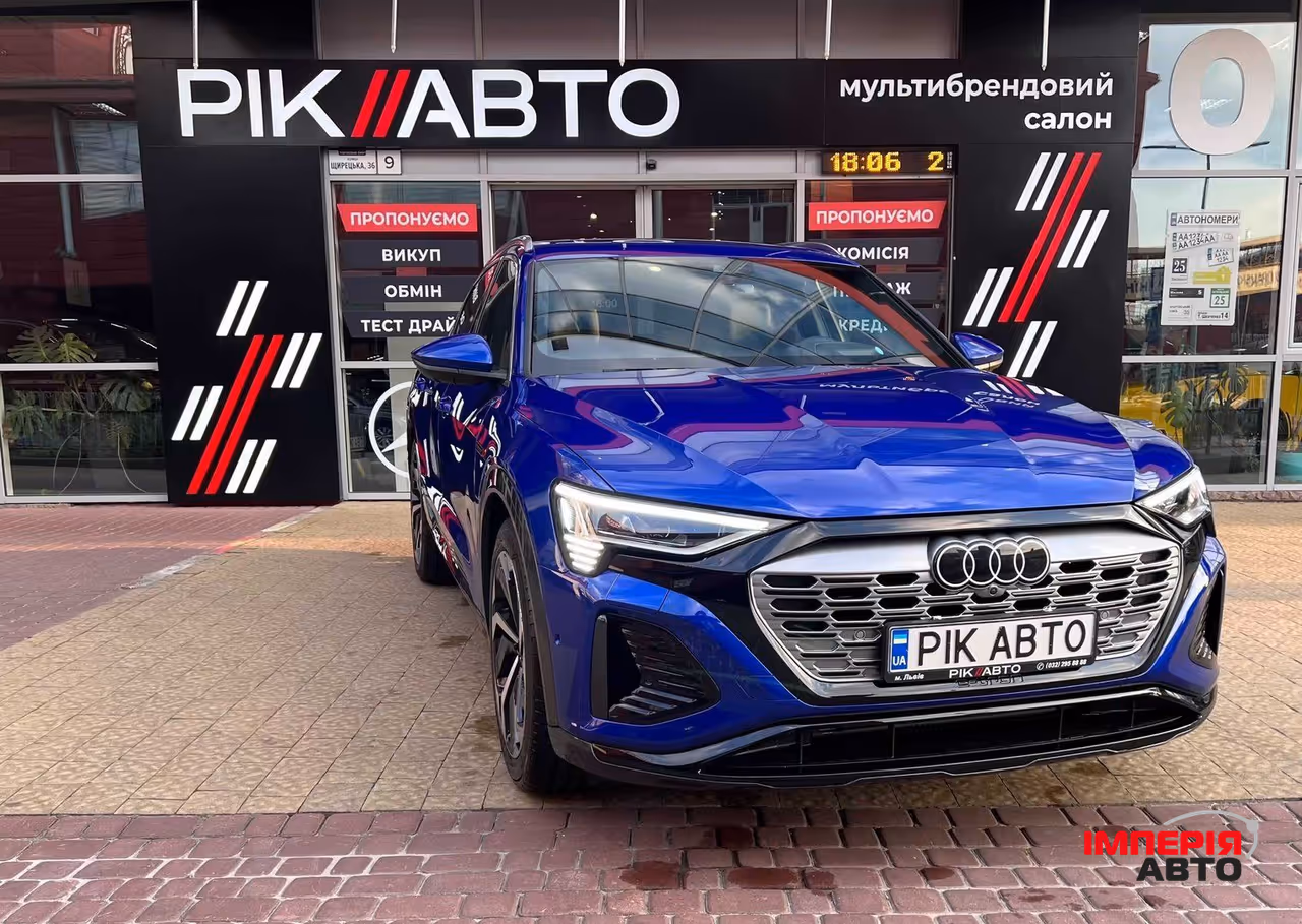 Audi Q8 e-tron - фото 1