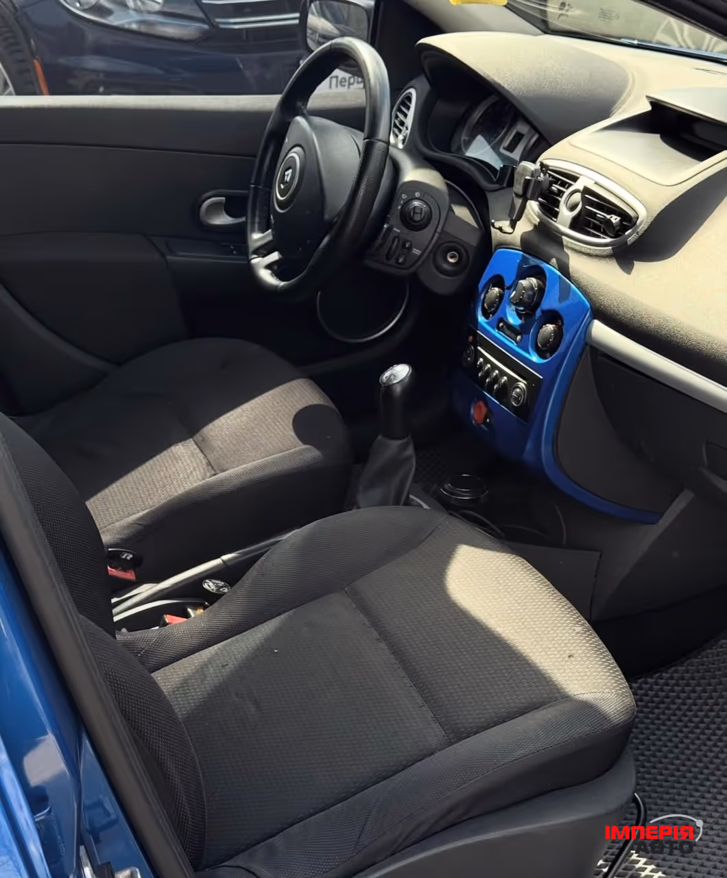 Renault Clio - фото 8