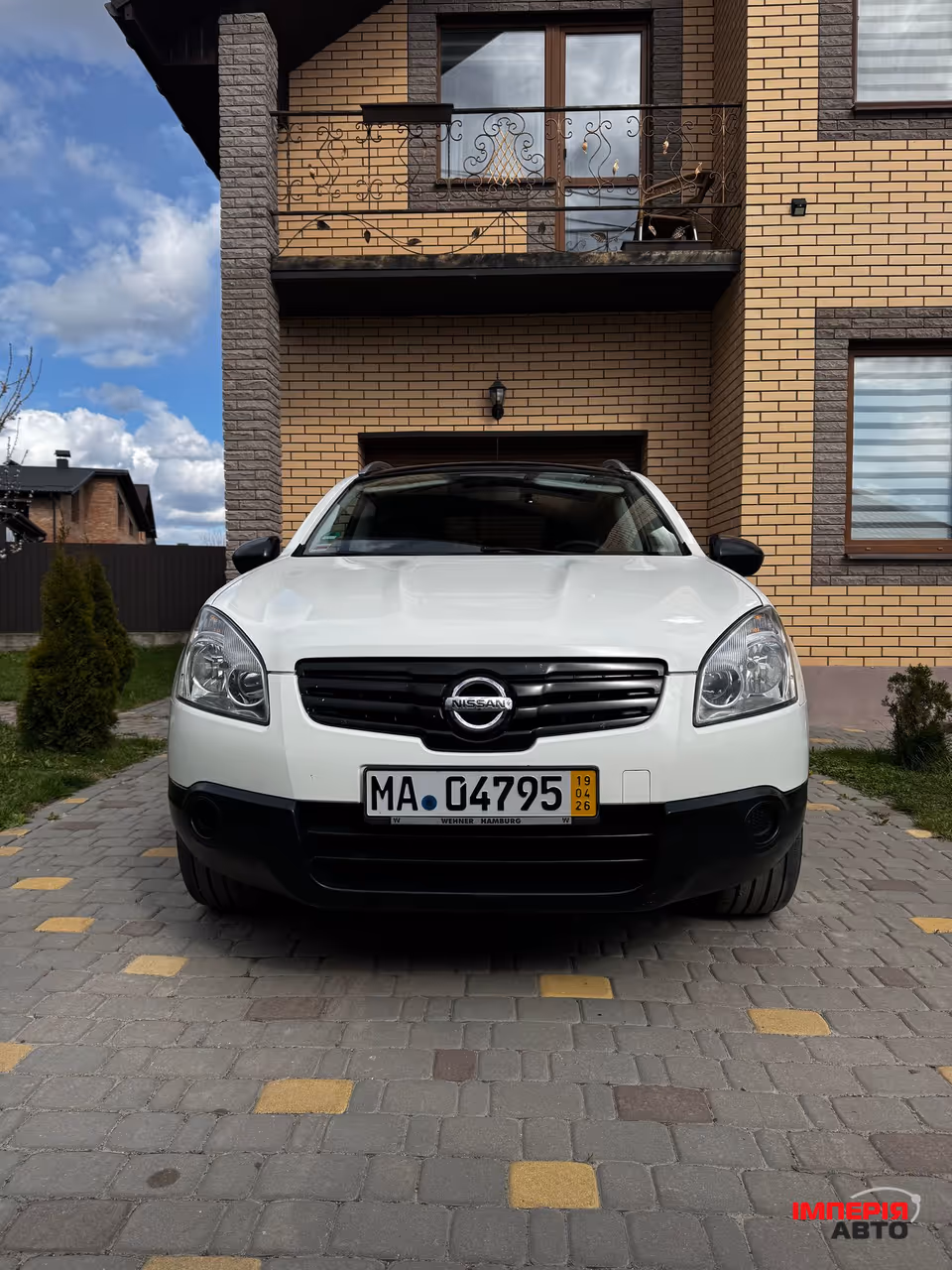 Nissan Qashqai+2 - фото 1