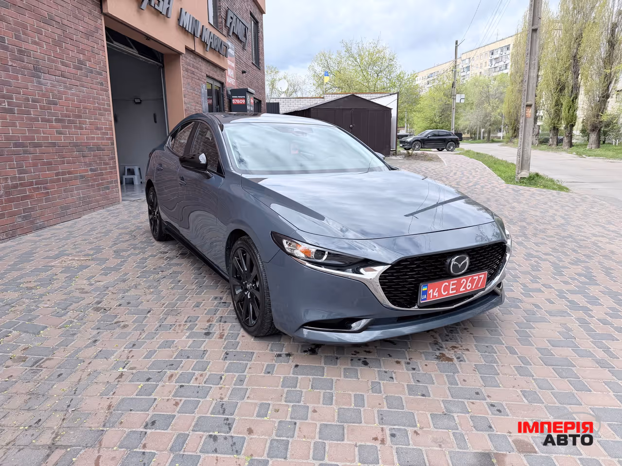 Mazda 3 - фото 13