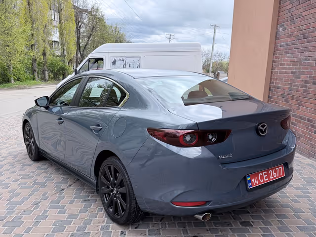 Mazda 3 - фото 2