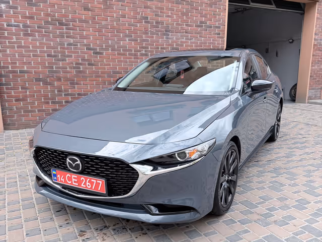 Mazda 3 - фото 5