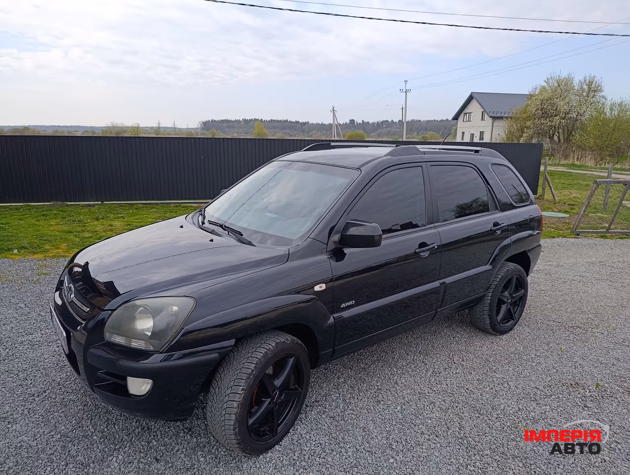 Kia Sportage - фото 1