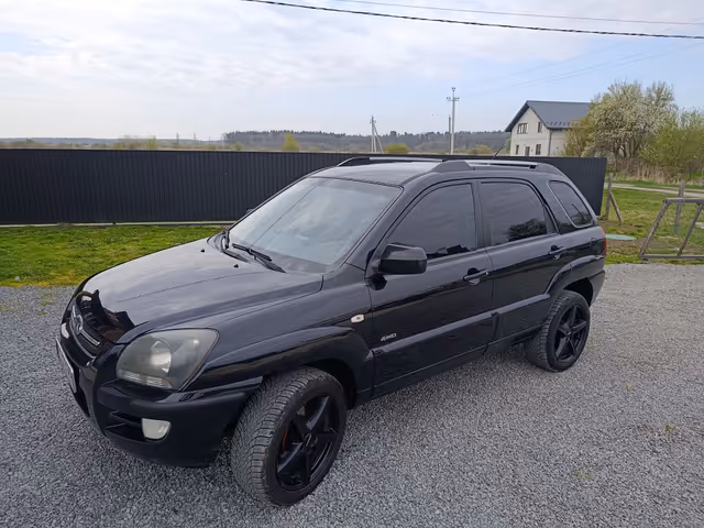 Kia Sportage - фото 1