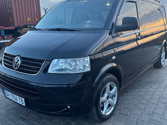 Volkswagen Caravelle - фото 1