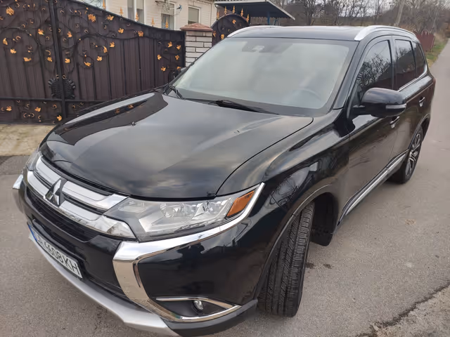 Mitsubishi Outlander - фото 1