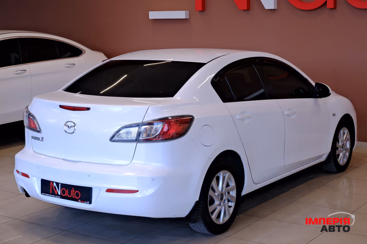 Mazda 3 - фото 5