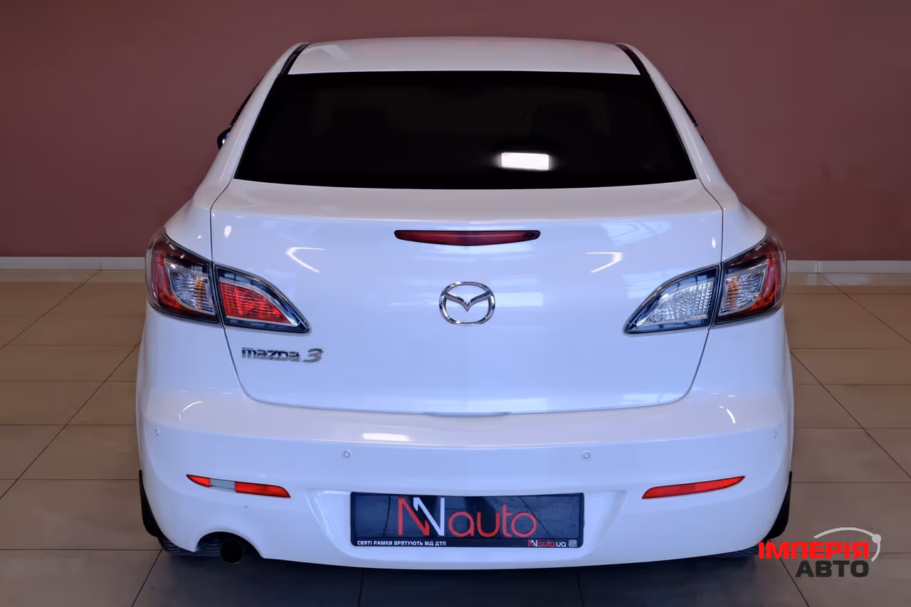 Mazda 3 - фото 6