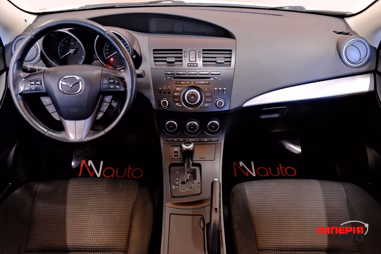 Mazda 3 - фото 7