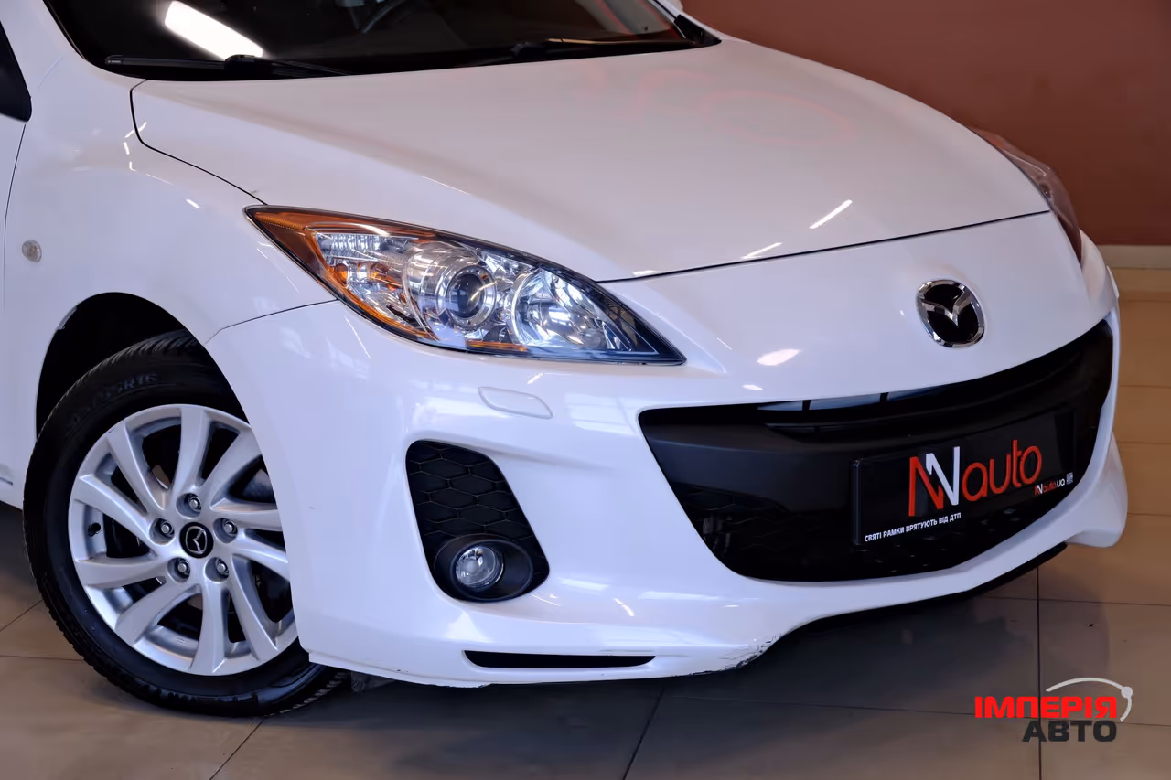 Mazda 3 - фото 3