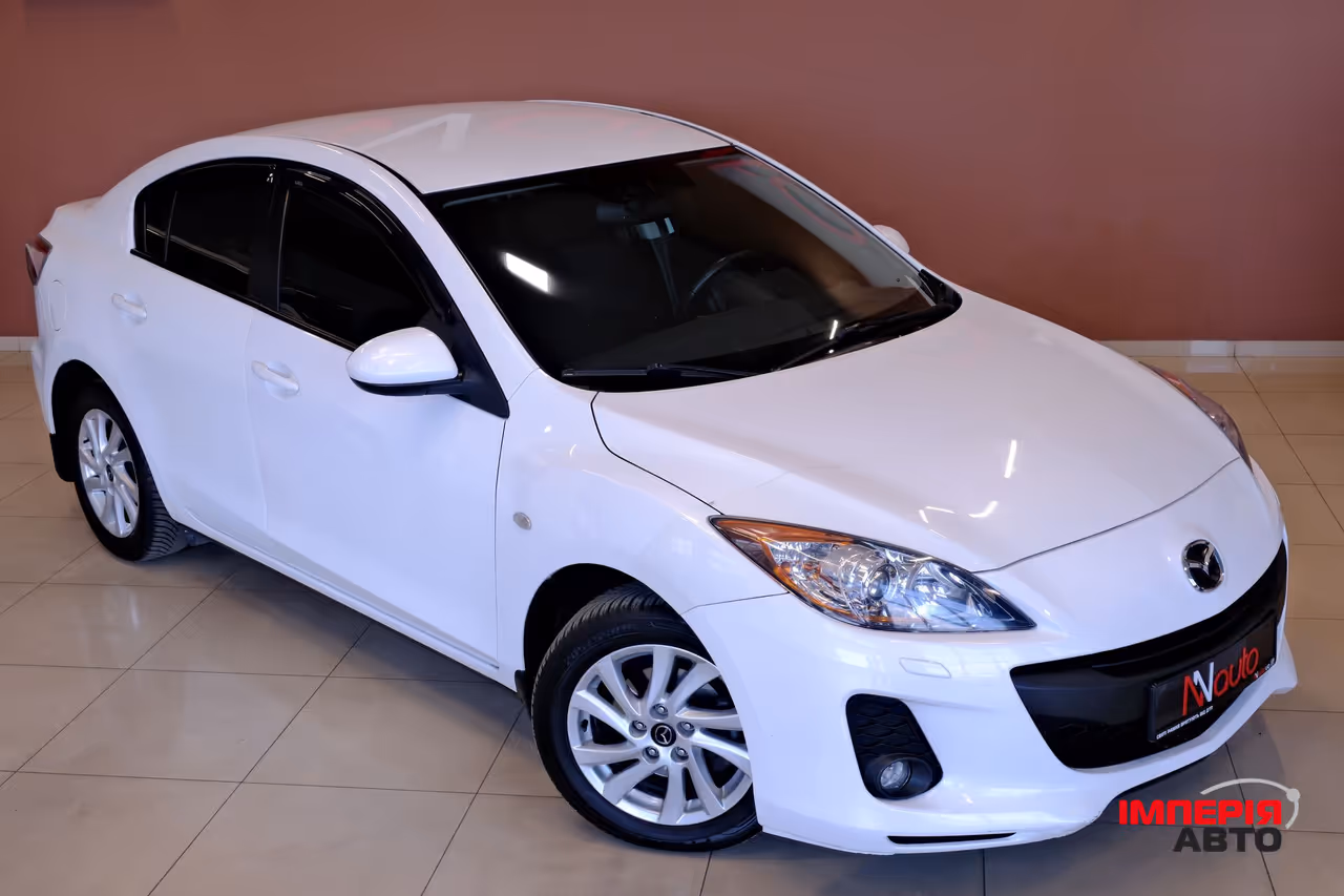 Mazda 3 - фото 4