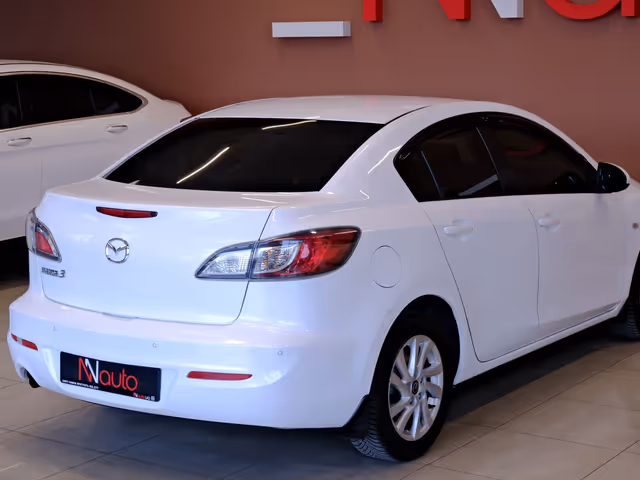 Mazda 3 - фото 5