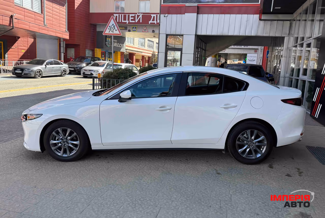 Mazda 3 - фото 10