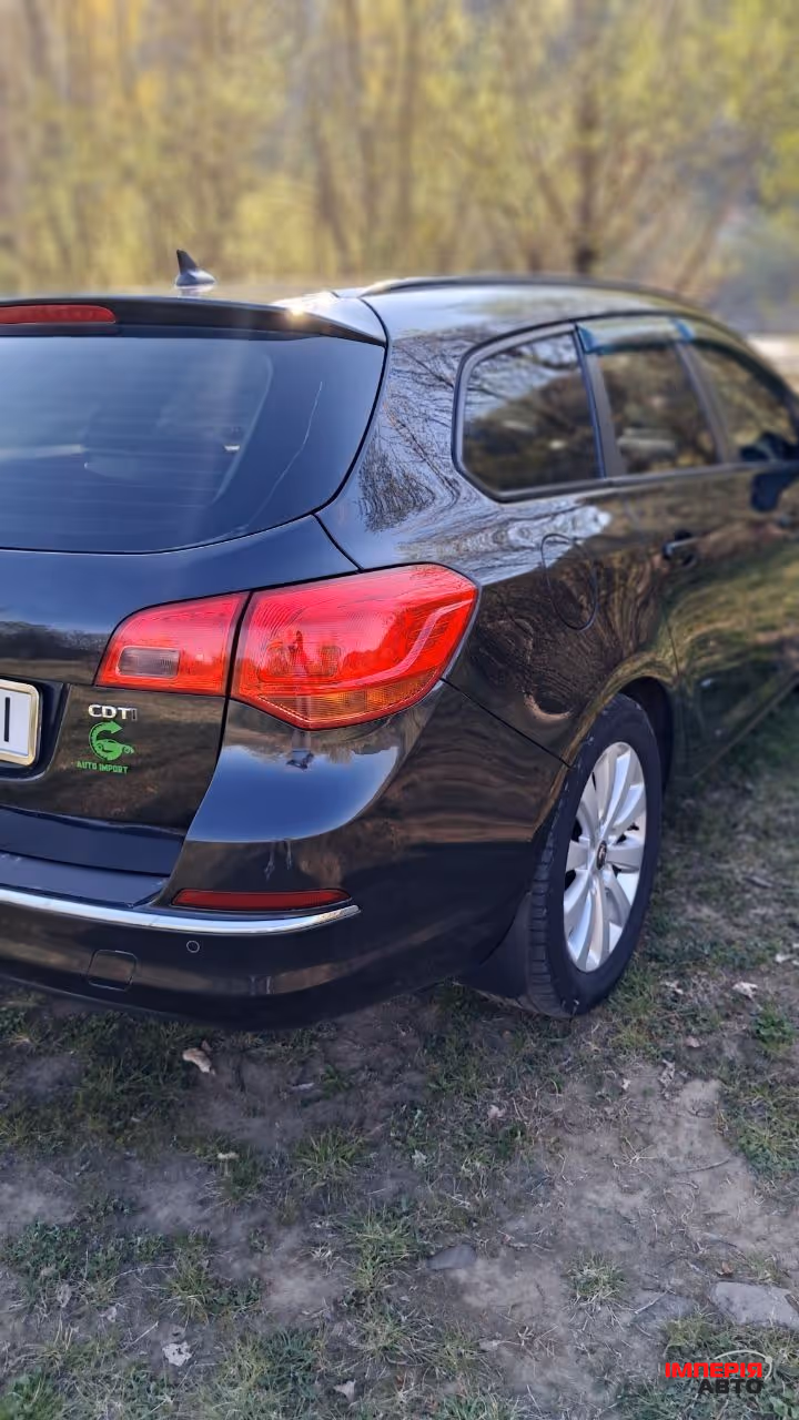 Opel Astra - фото 6